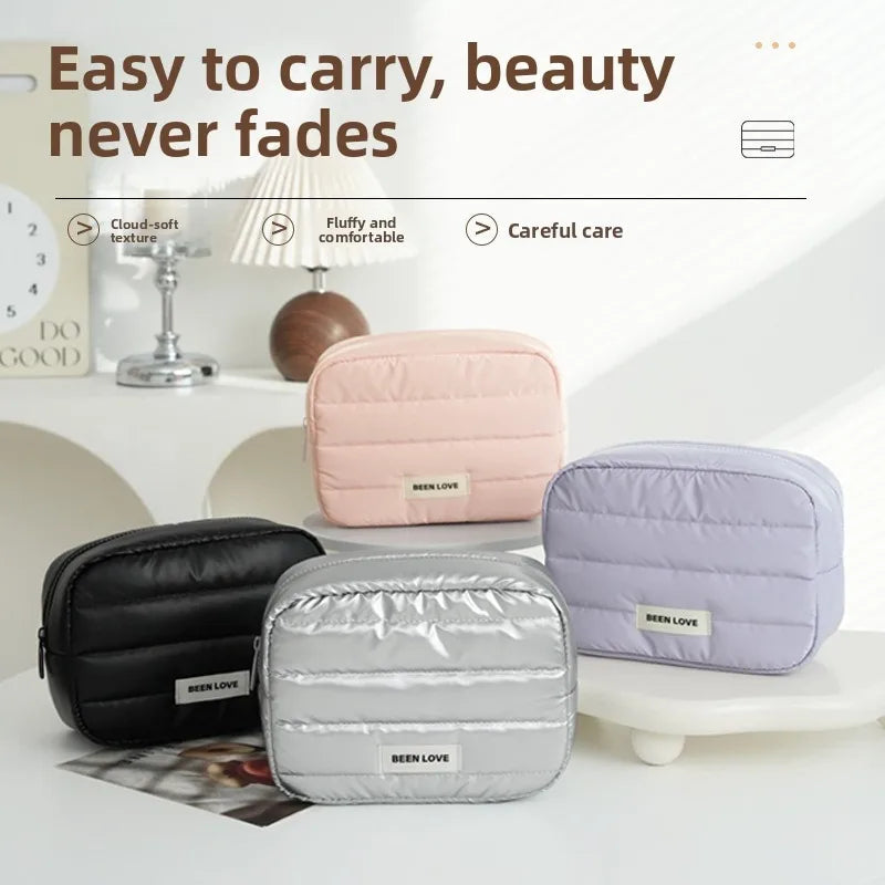 Surnelia open travel makeup bag in pink color showing cosmetics storage slots